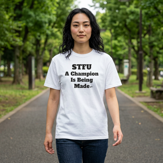 Motivational STFU Tee — "A Champion Is Being Made"